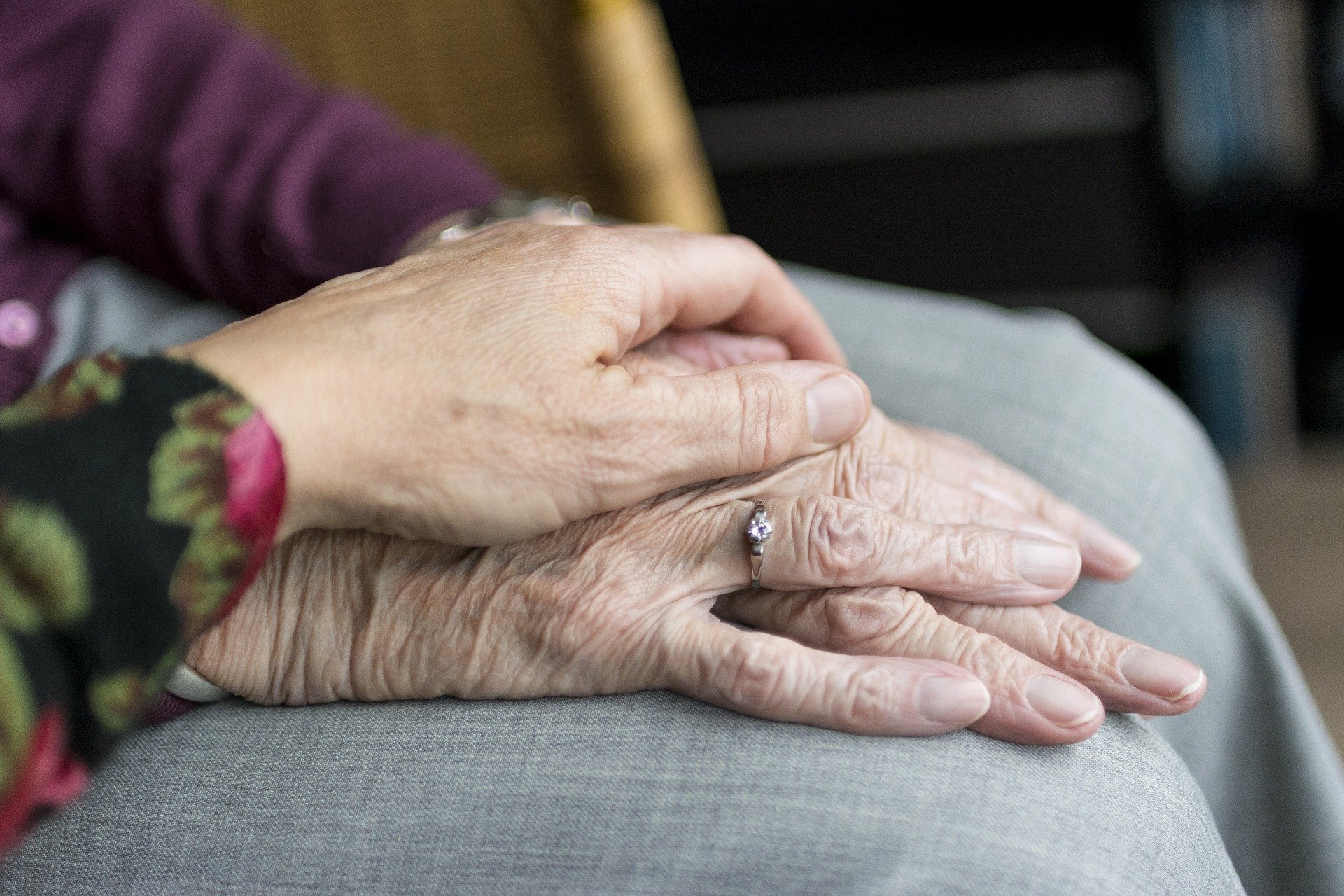 elderly hands resting on each other